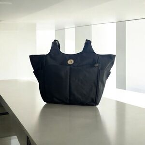 Black Tote Bag with Ample Storage and Classic Design
